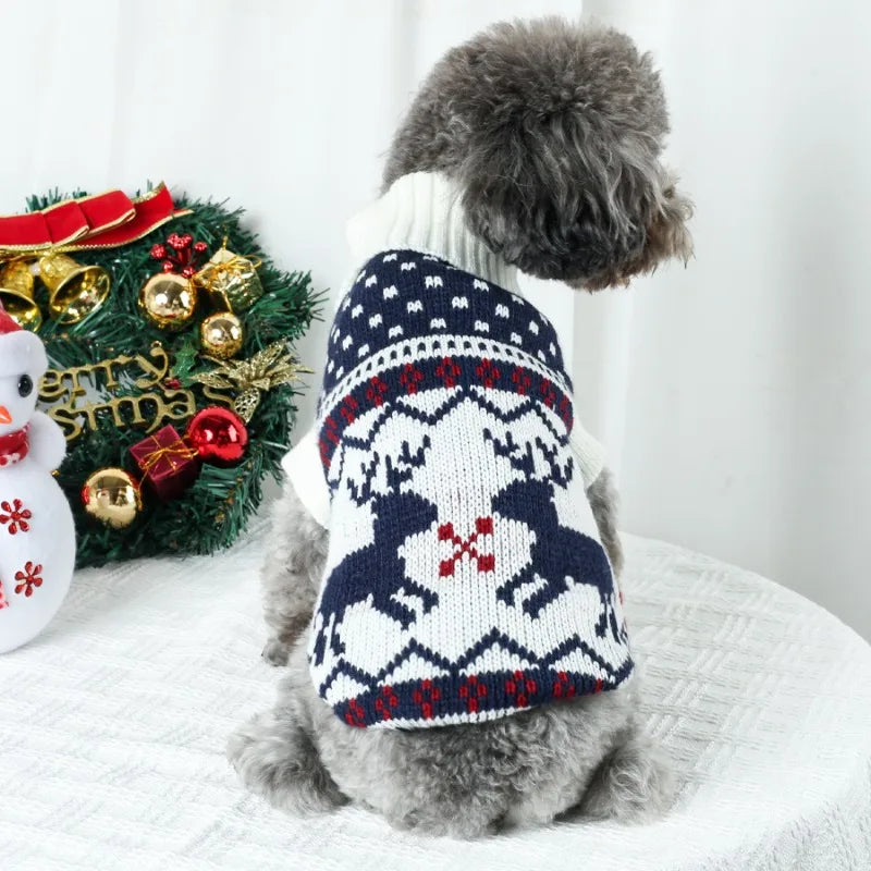 Back view of white and navy reindeer dog sweater with polka dot yoke and snowflake knit detail