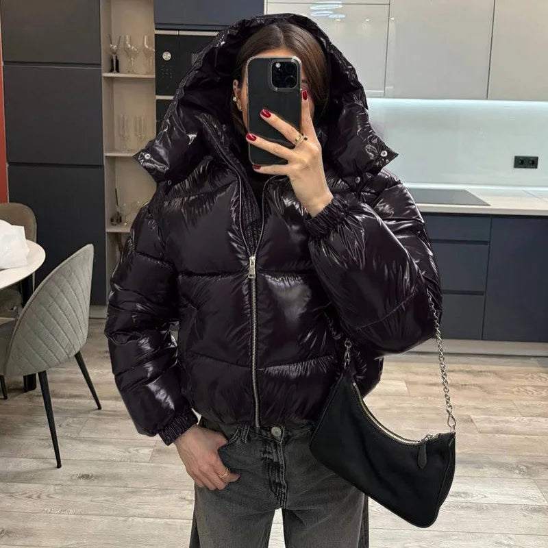 Woman wearing the Black hooded cropped bubble puffer jacket